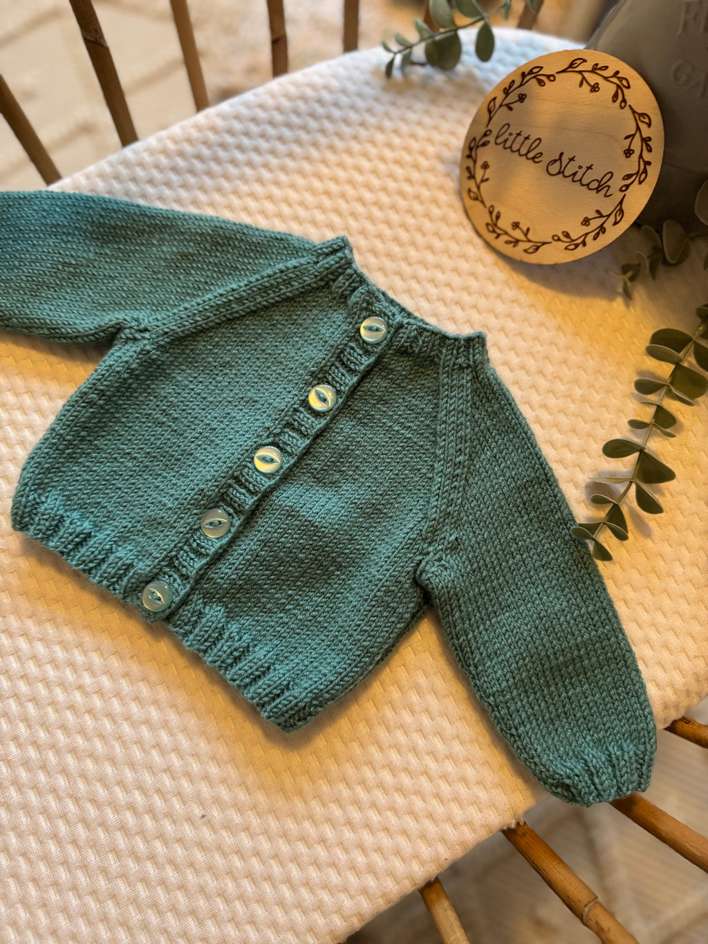 Newborn bottle green handknitted cardigan