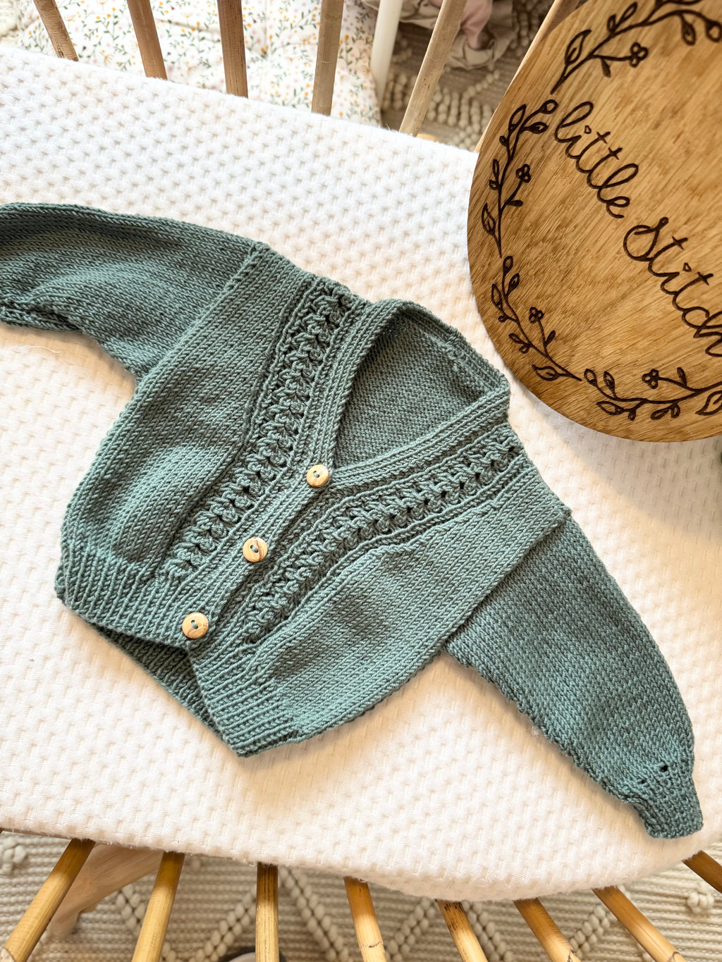 Green newborn hand knitted cardigan