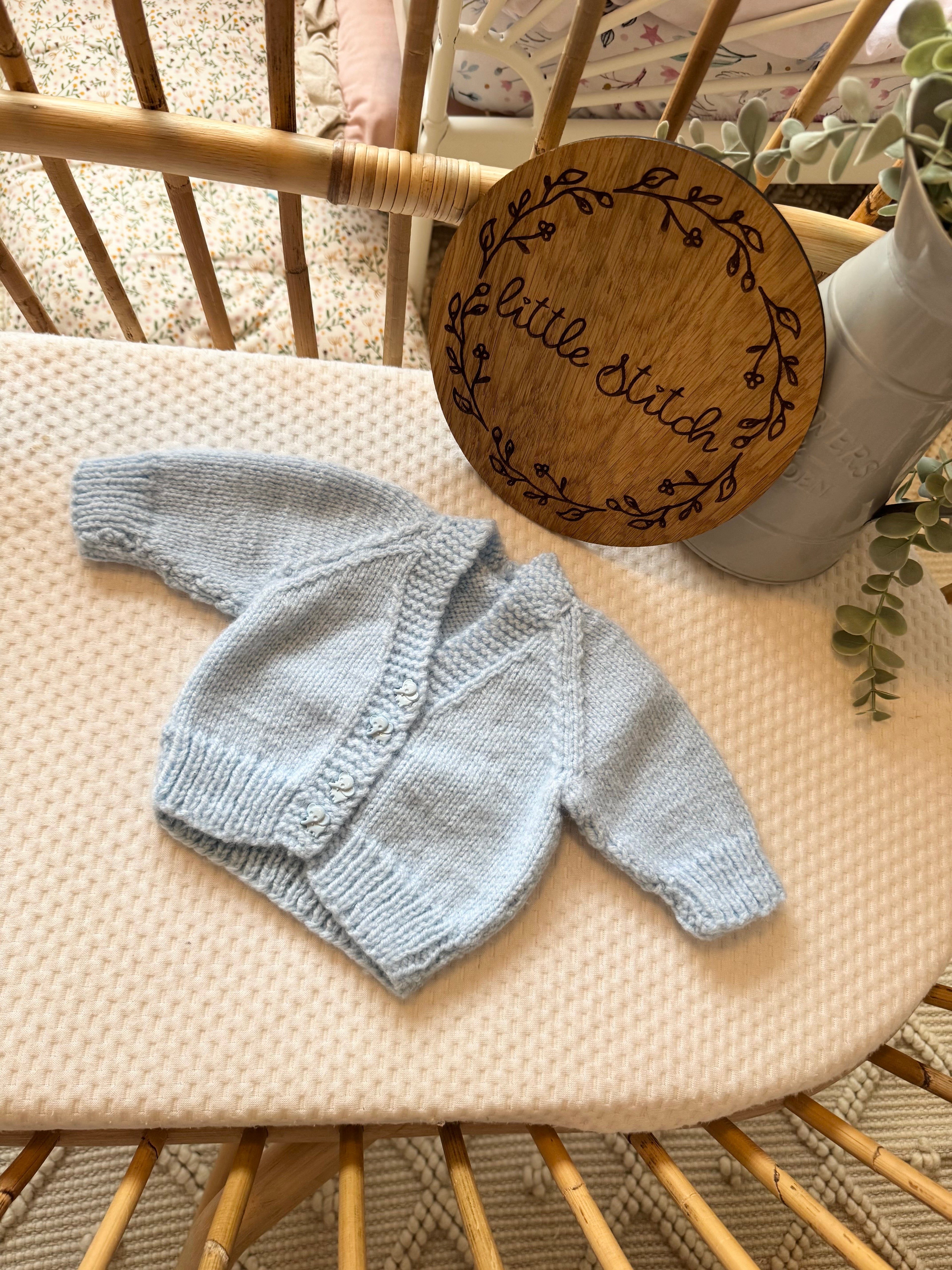 Blue newborn hand knitted cardigan