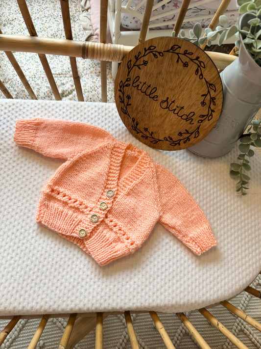 Orange newborn handknitted cardigan