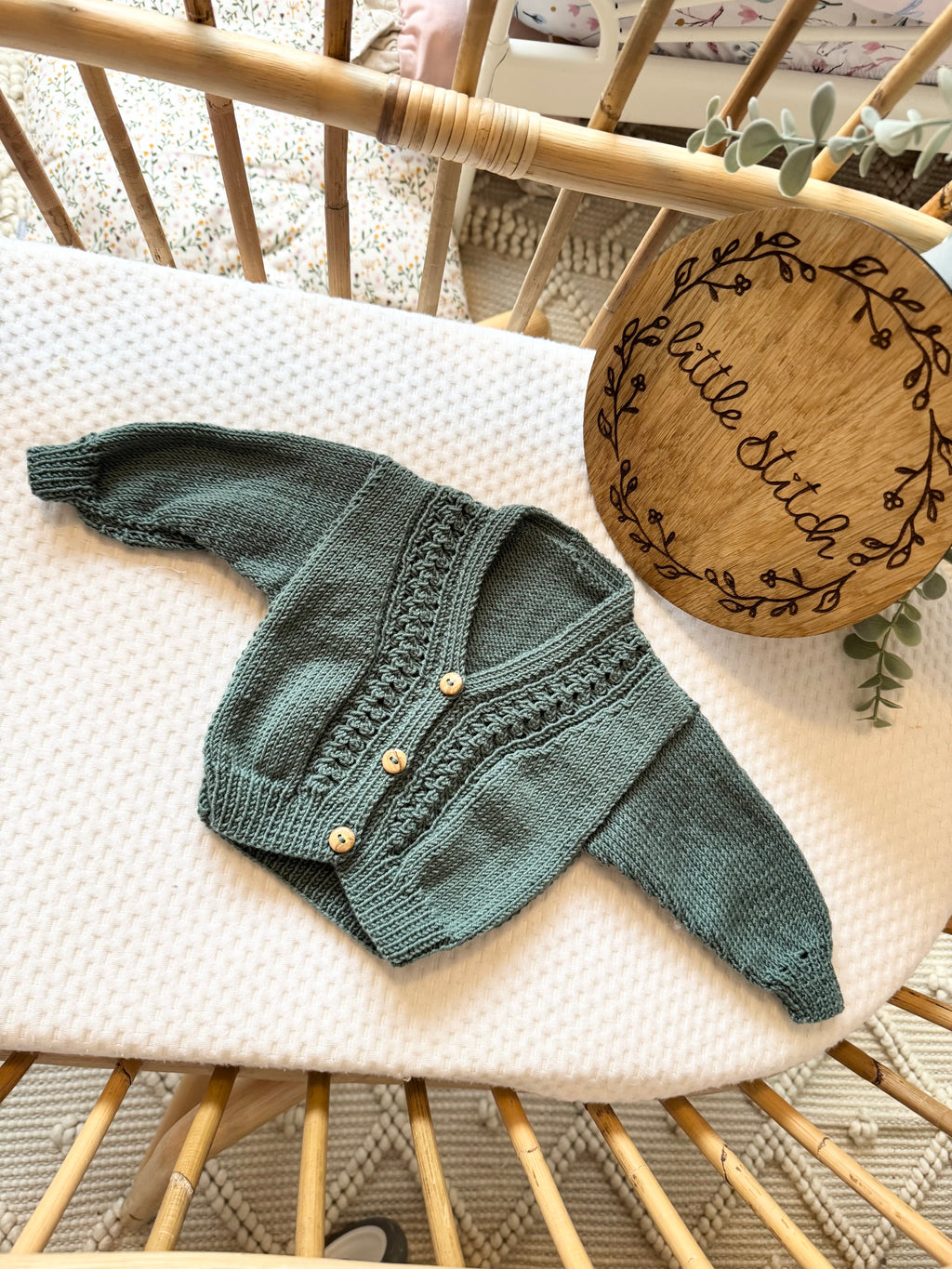 Green newborn hand knitted cardigan