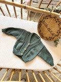 Green newborn hand knitted cardigan