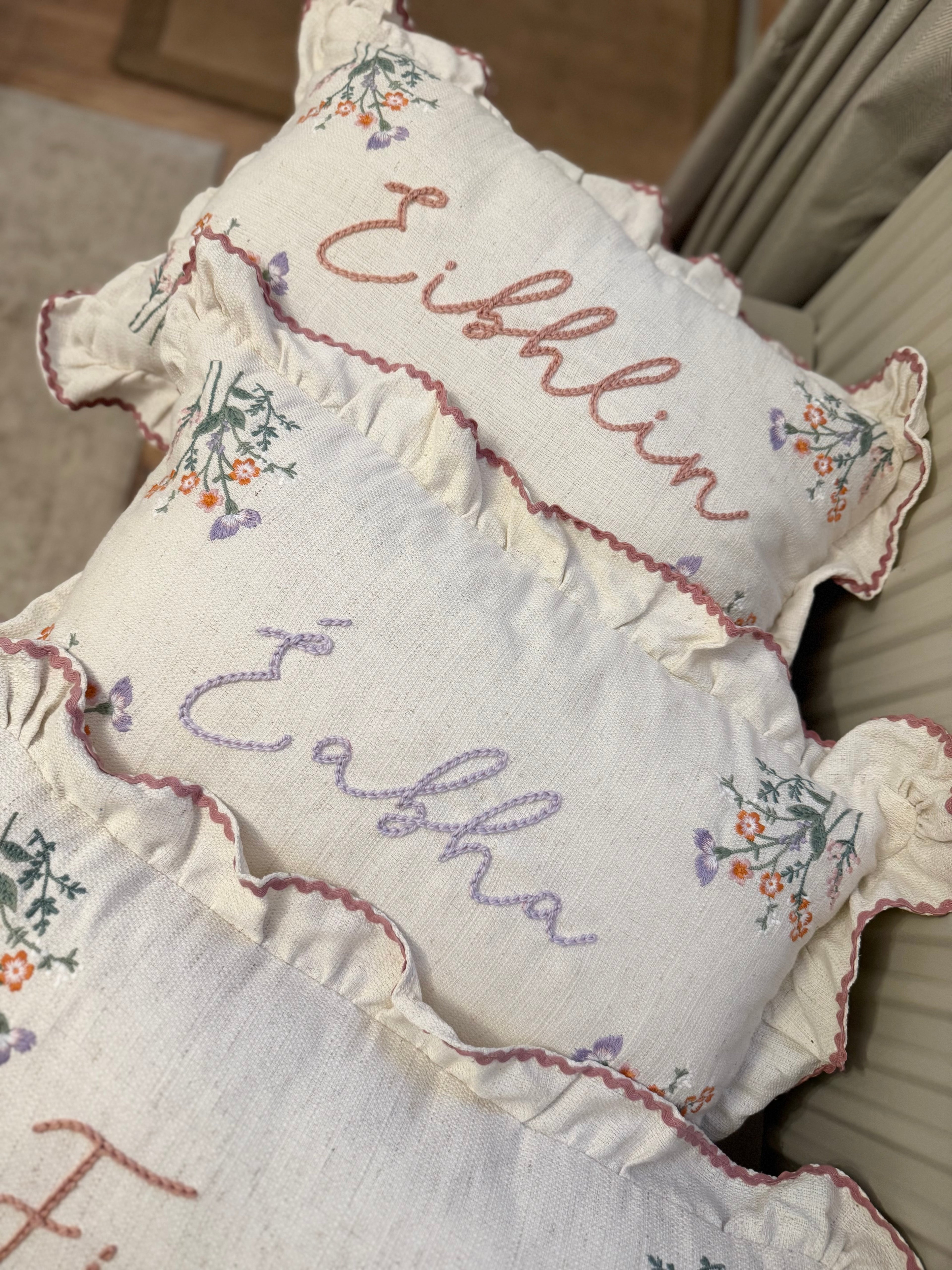 Hand embroidered floral cushion