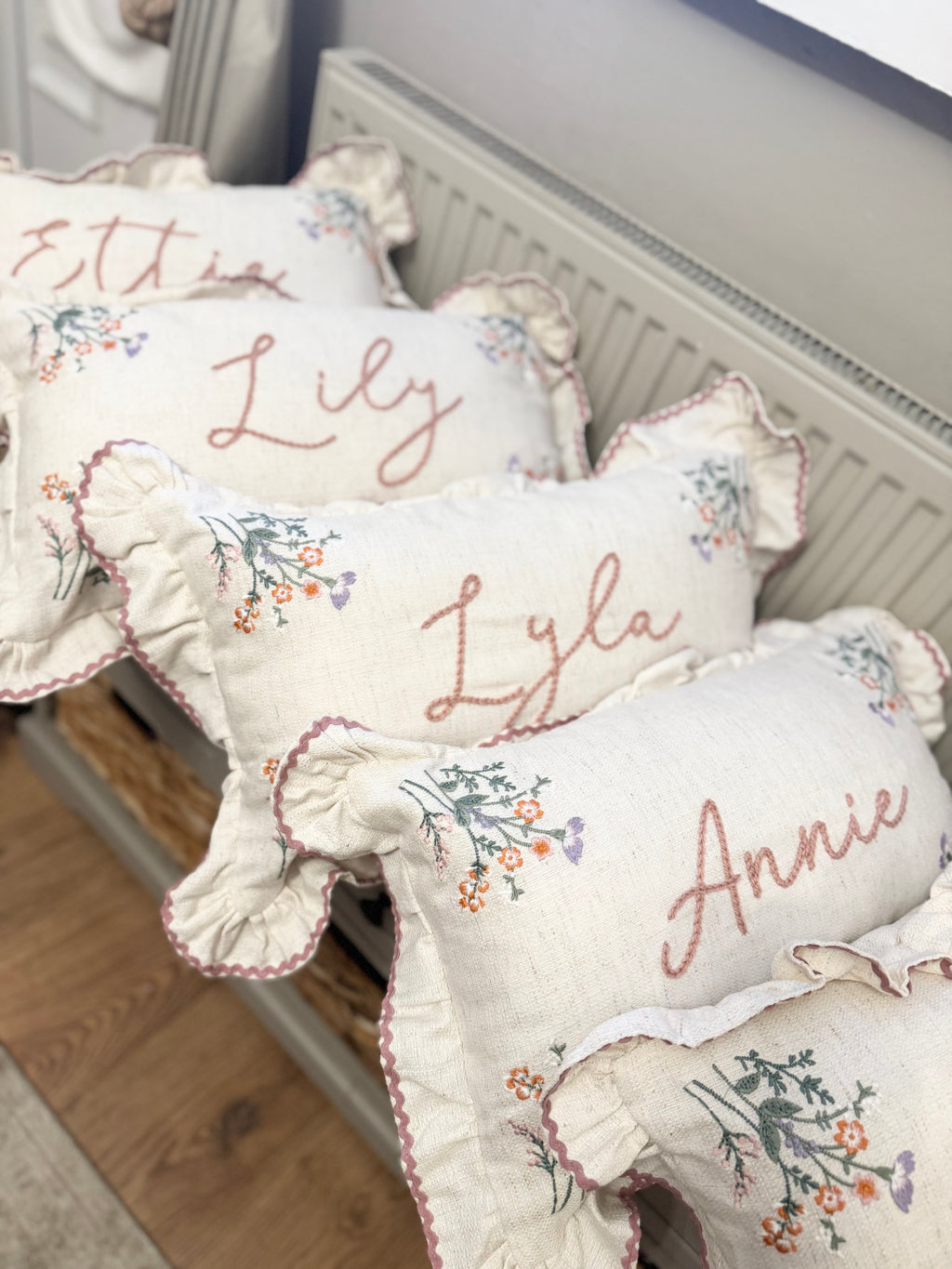 Hand embroidered floral cushion