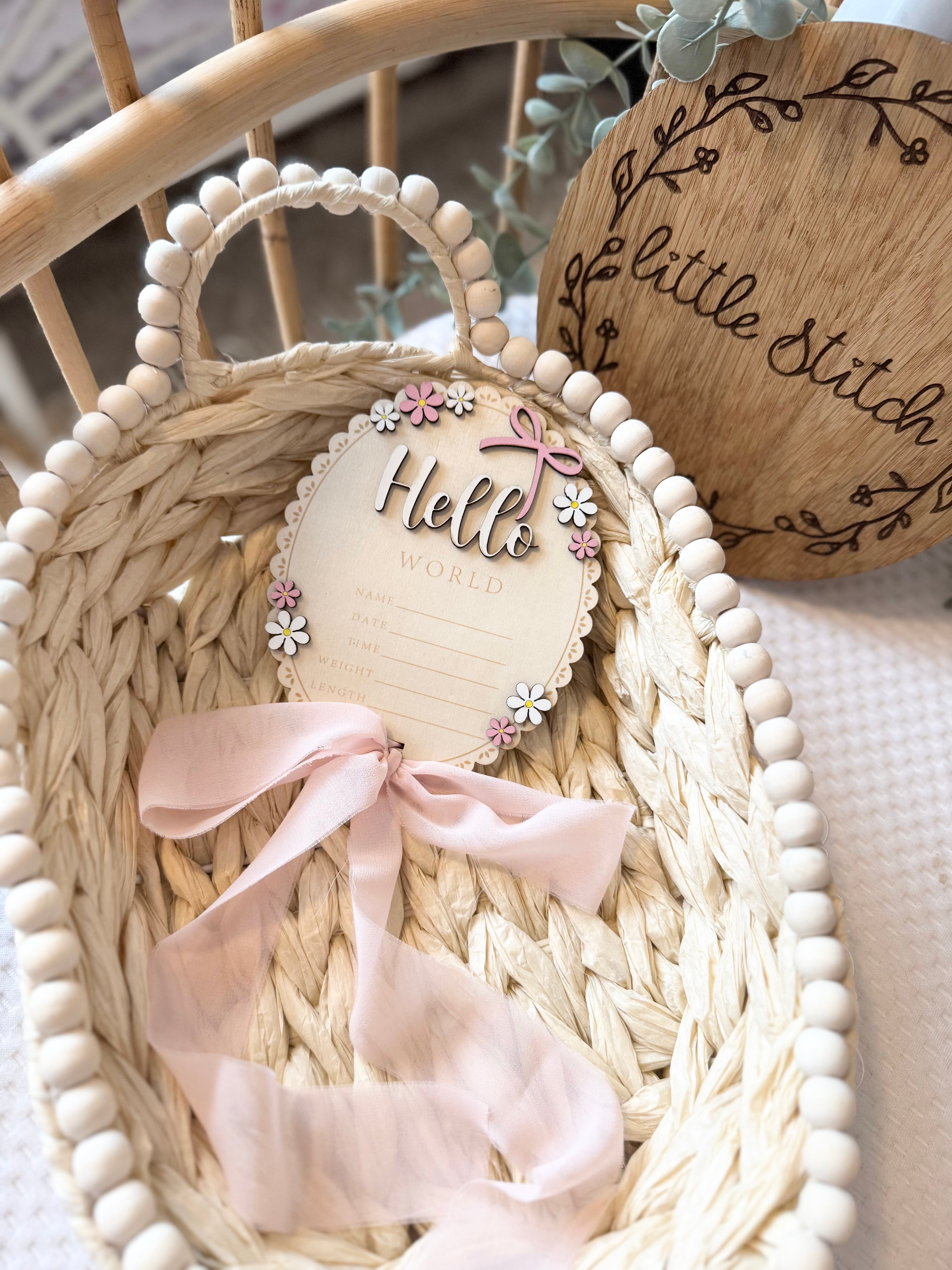 Floral hello world plaque with chiffon bow attachment