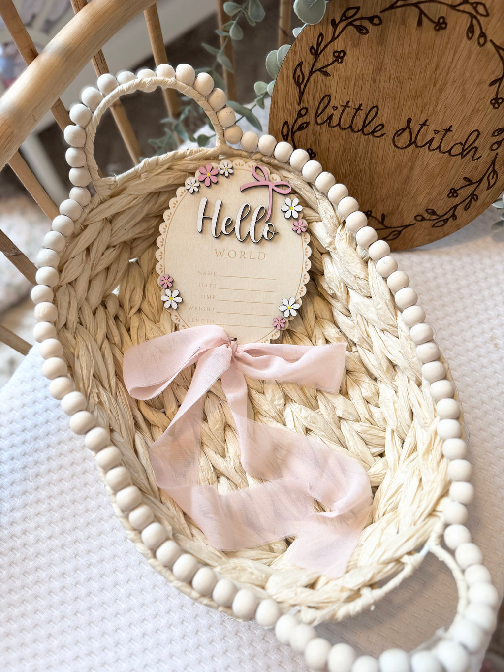Floral hello world plaque with chiffon bow attachment