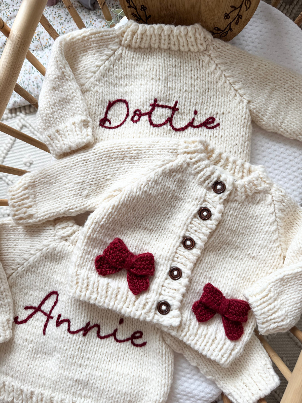 Hand knitted bow cardigan - includes 1 name added to the back