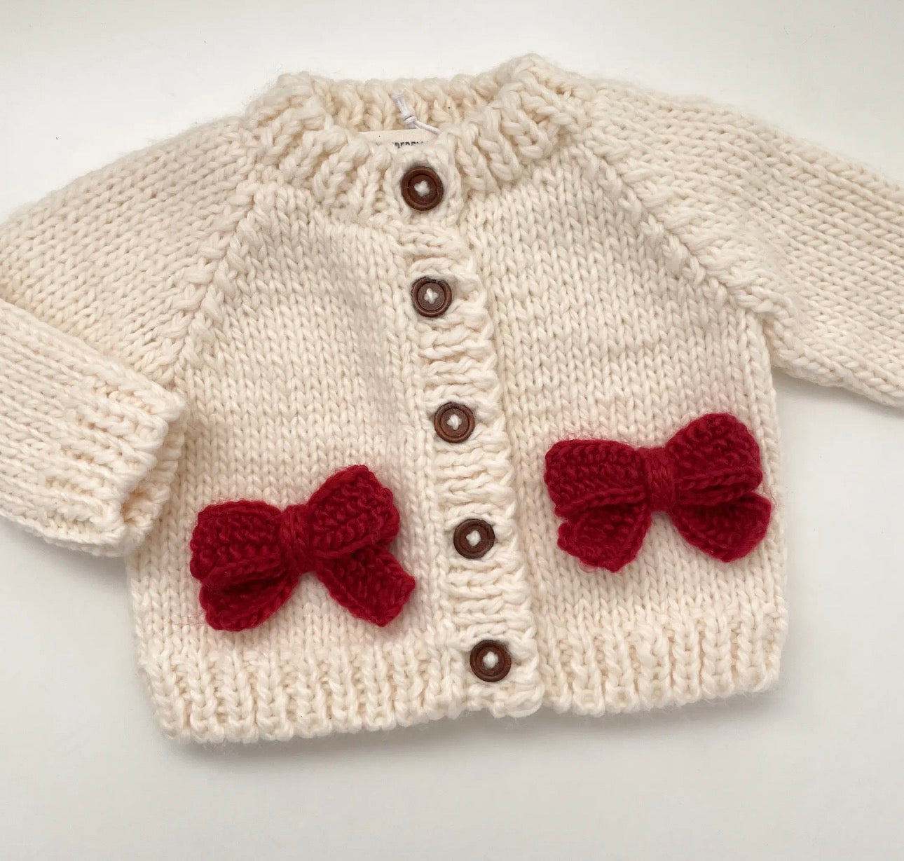 Hand knitted bow cardigan - includes 1 name added to the back
