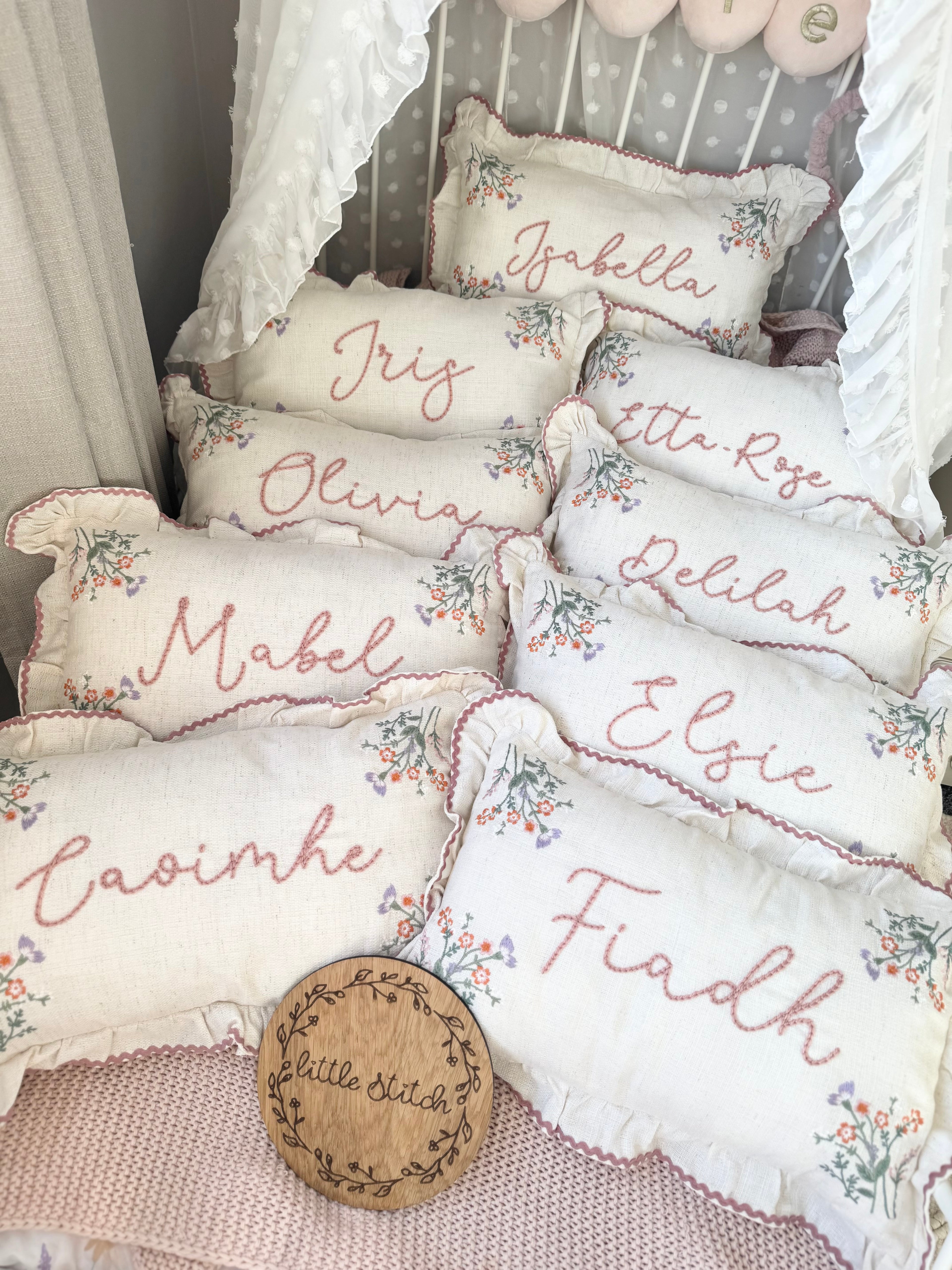 Hand embroidered floral cushion