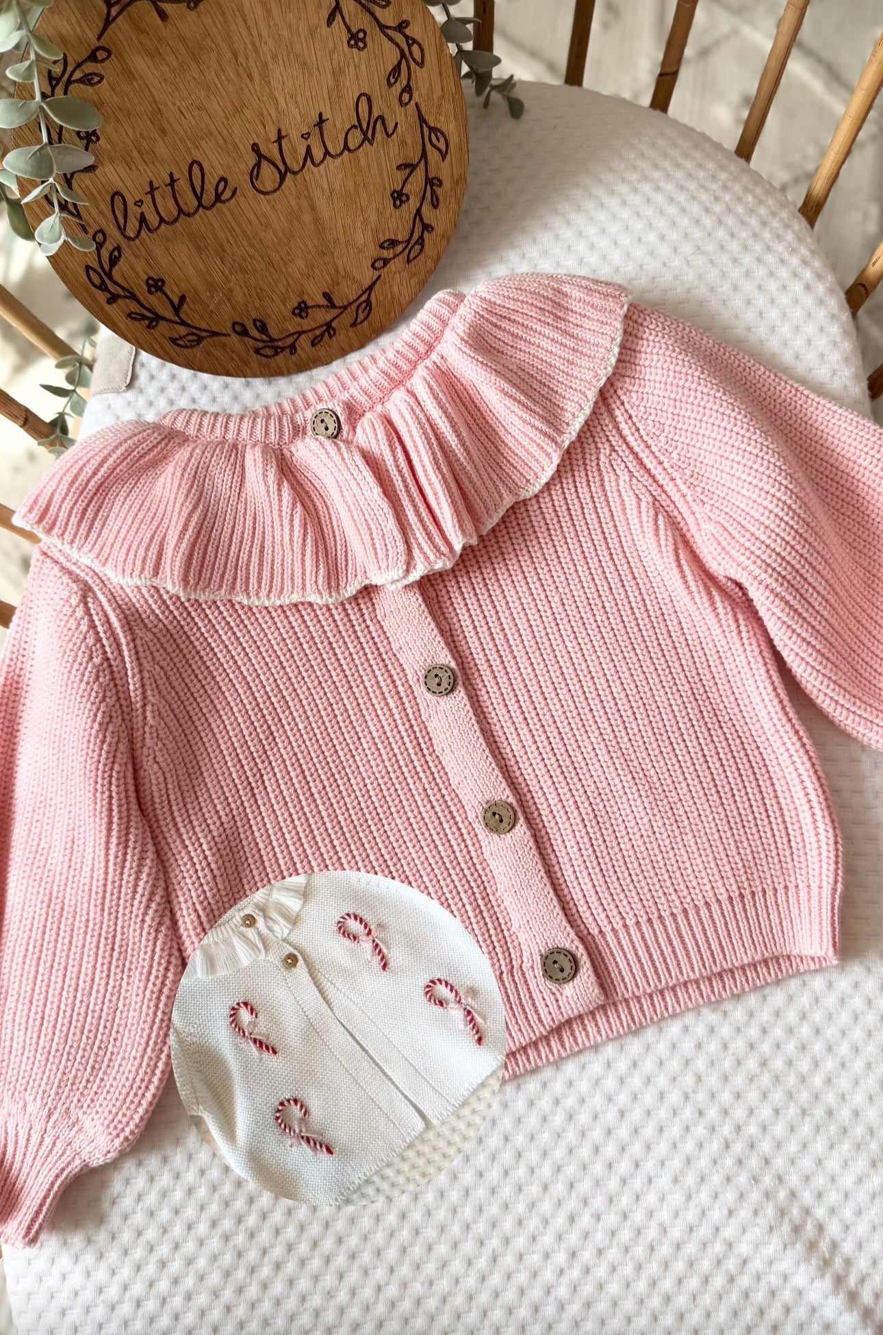 Pink frilly cardigan - candy cane design and 1 name on the back