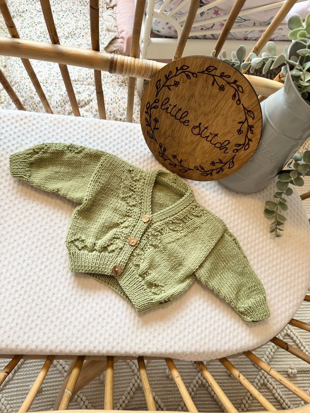 Green newborn handknitted cardigan