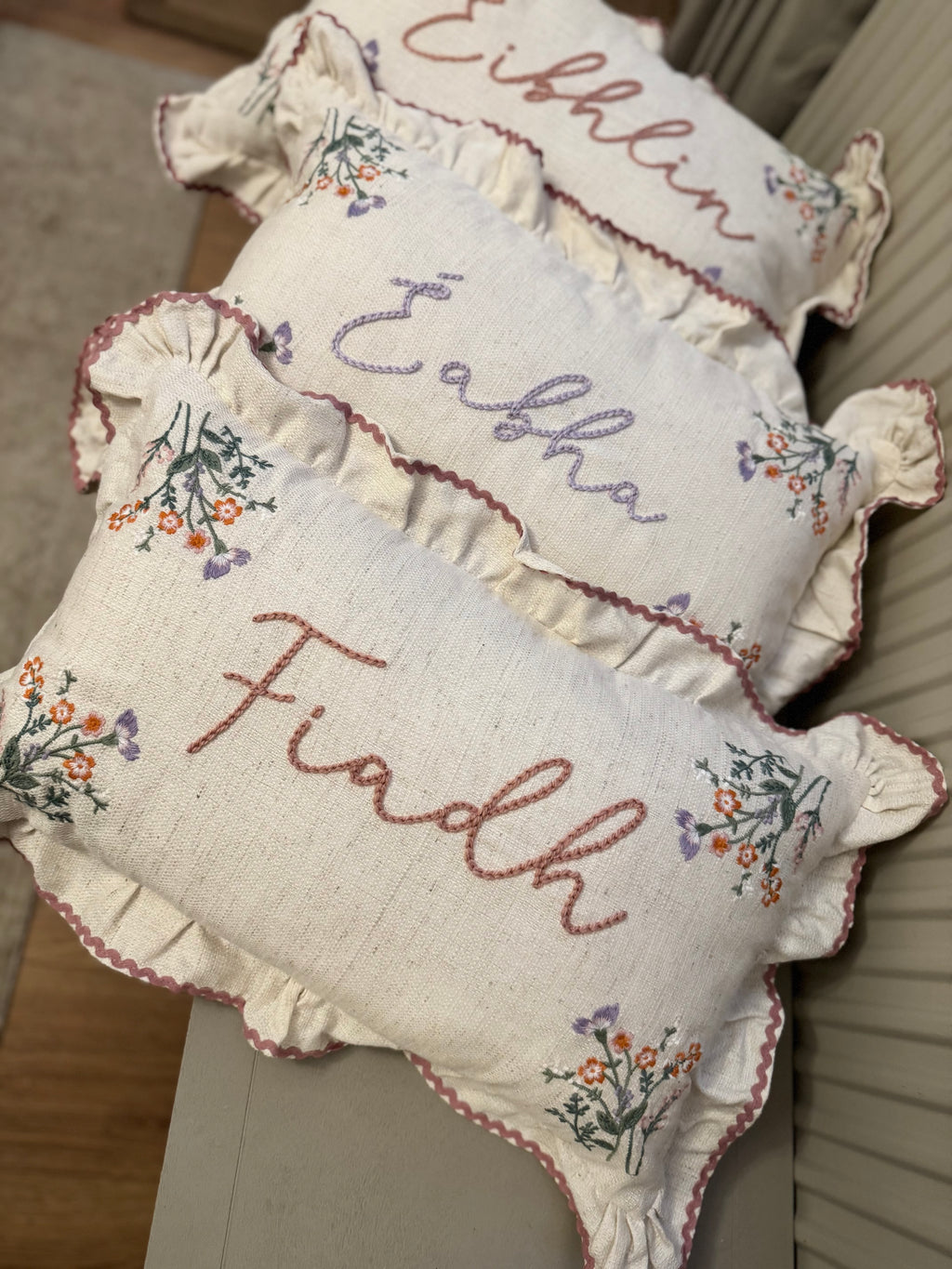 Hand embroidered floral cushion