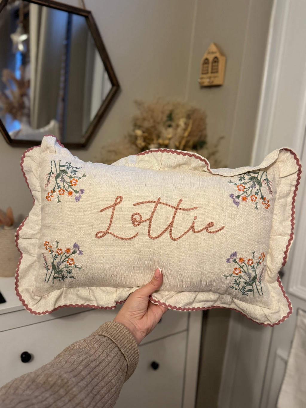 Hand embroidered floral cushion